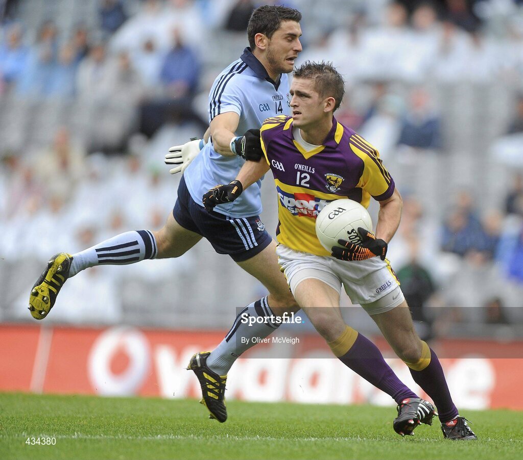 13 June 2010; Adrian Flynn, Wexford, in action against Bernard Brogan, Dublin. Leinster GAA Football Senior Championship Quarter-Final, Dublin v Wexford, Croke Park, Dublin. Picture credit: Oliver McVeigh / SPORTSFILE