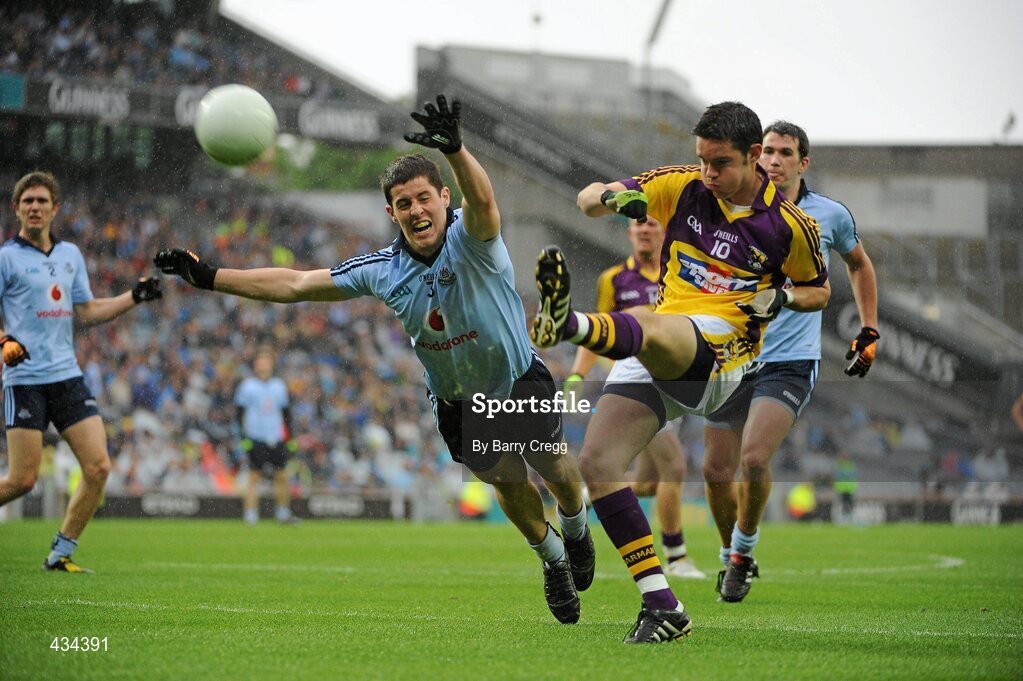 13 June 2010; Shane Roche, Wexford, in action against Rory O'Carroll, Dublin. Leinster GAA Football Senior Championship Quarter-Final, Dublin v Wexford, Croke Park, Dublin. Picture credit: Barry Cregg / SPORTSFILE