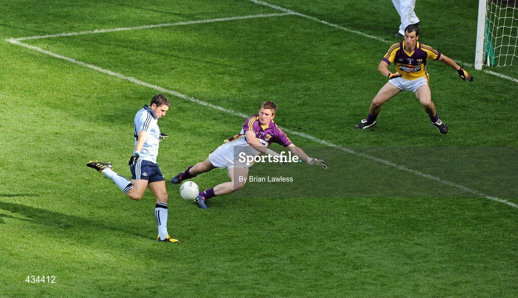 13 June 2010; Bernard Brogan, Dublin, shoots past Wexford goalkeeper Anthony Masterson and Graeme Molloy to score his side's second goal. Leinster GAA Football Senior Championship Quarter-Final, Dublin v Wexford, Croke Park, Dublin. Picture credit: Brian Lawless / SPORTSFILE