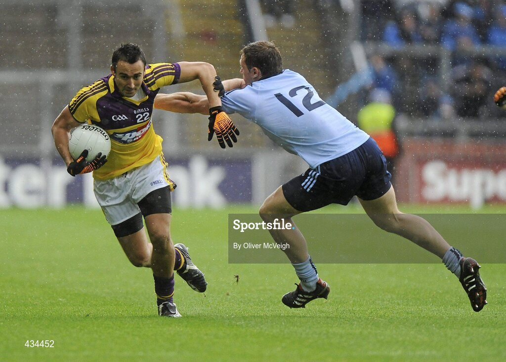 13 June 2010; Adrian Morrissey, Wexford, in action against Paul Flynn, Dublin. Leinster GAA Football Senior Championship Quarter-Final, Dublin v Wexford, Croke Park, Dublin. Picture credit: Oliver McVeigh / SPORTSFILE