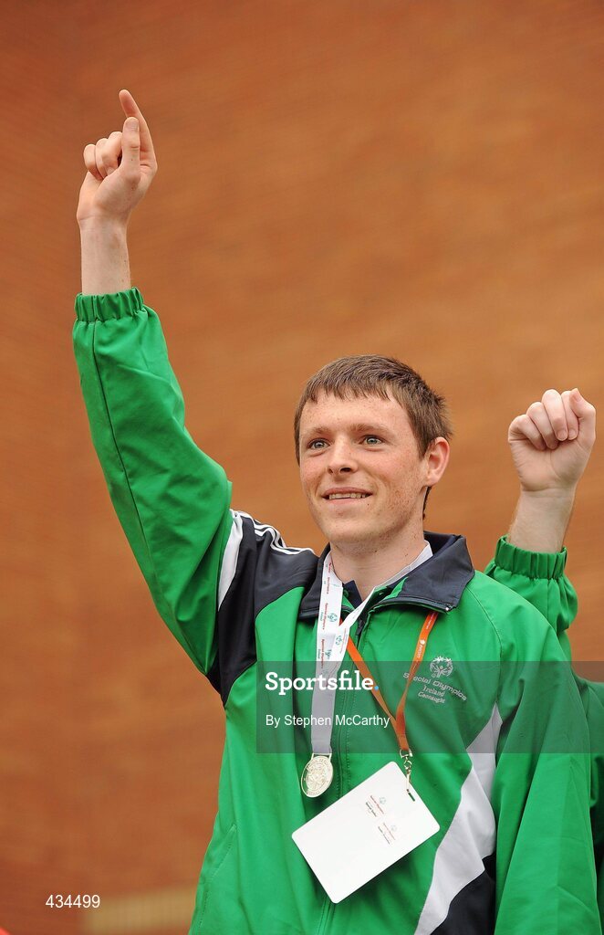 13 June 2010; Connacht Region athlete James Carr, from Athlone, Westmeath, celebrates his silver medal in the relay atheltics event during the final day of the 2010 Special Olympics Ireland Games. University of Limerick, Limerick. Picture credit: Stephen McCarthy / SPORTSFILE