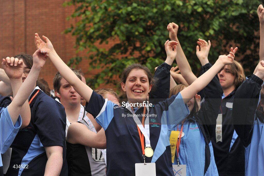 13 June 2010; Eastern Region athlete Elaine Brennan, Tallaght, Dublin, celebrates with her gold medal following the 4x100m relay athletics presentation during the final day of the 2010 Special Olympics Ireland Games. University of Limerick, Limerick. Picture credit: Stephen McCarthy / SPORTSFILE