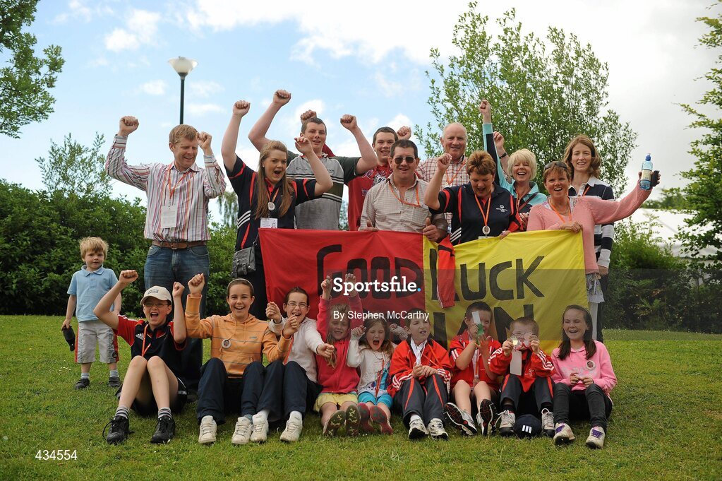 13 June 2010; Bandon, Cork, athletes Conor O'Dwyer, Ronan Desmond and Liam Buckley celebrate with friends and family after collecting their medals during the final day of the 2010 Special Olympics Ireland Games. University of Limerick, Limerick. Picture credit: Stephen McCarthy / SPORTSFILE