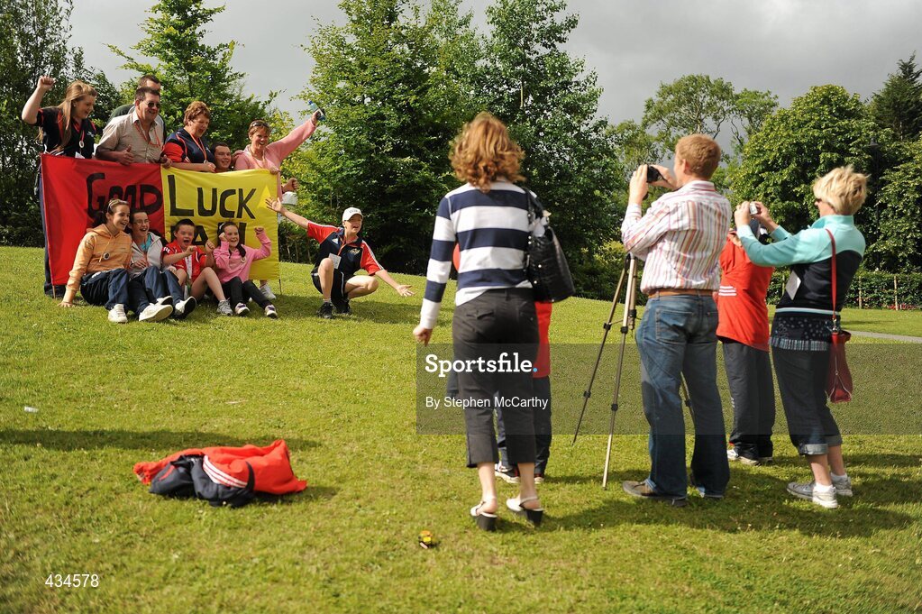 13 June 2010; Munster Region athlete Ronan Desmond, from Bandon, Cork, has his picture taken with friends and family after collecting his medals during the final day of the 2010 Special Olympics Ireland Games. University of Limerick, Limerick. Picture credit: Stephen McCarthy / SPORTSFILE