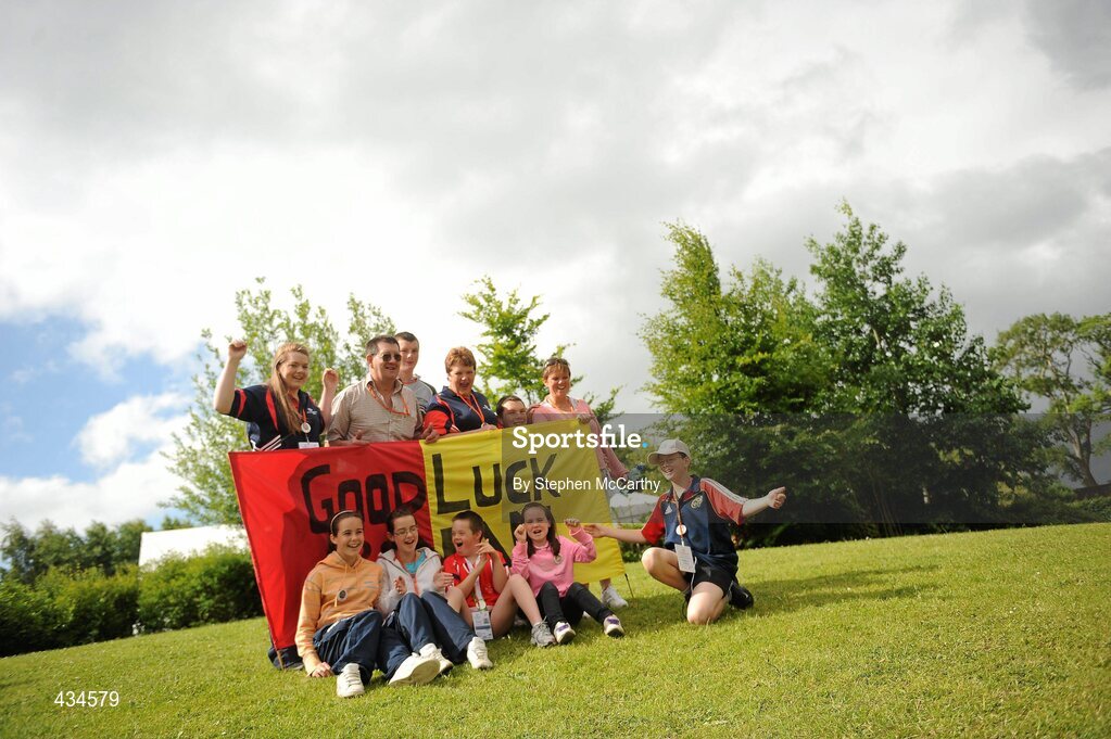 13 June 2010; Munster Region athlete Ronan Desmond, from Bandon, Cork, celebrates with friends and family after collecting his medals during the final day of the 2010 Special Olympics Ireland Games. University of Limerick, Limerick. Picture credit: Stephen McCarthy / SPORTSFILE