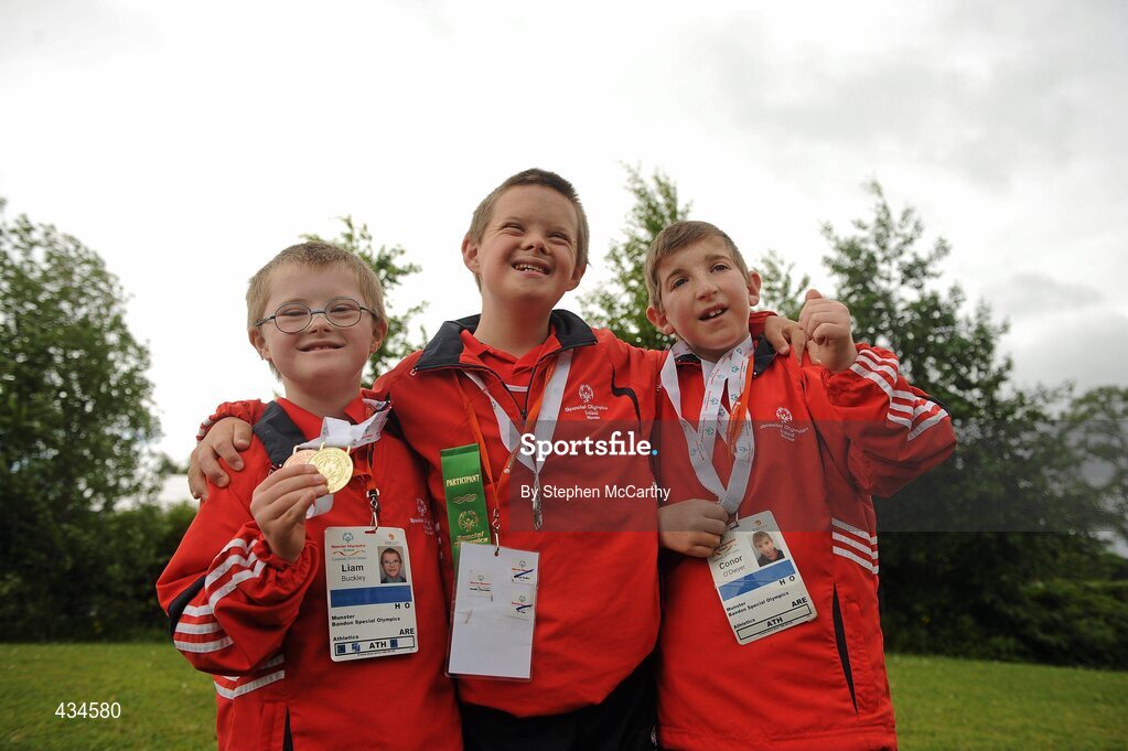 13 June 2010; Bandon, Cork, athletes, from left, Conor O'Dwyer, Ronan Desmond and Liam Buckley celebrate with friends and family after collecting their medals during the final day of the 2010 Special Olympics Ireland Games. University of Limerick, Limerick. Picture credit: Stephen McCarthy / SPORTSFILE