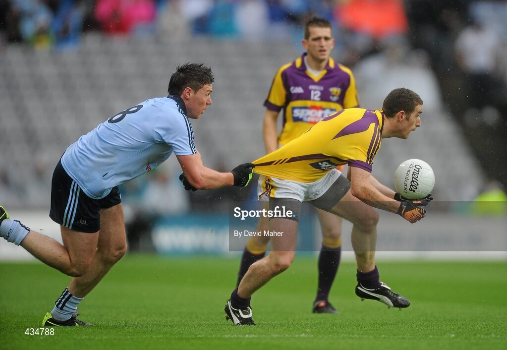 13 June 2010; Joey Wadding, Wexford, in action against Éamon Fennell, Dublin. Leinster GAA Football Senior Championship Quarter-Final, Dublin v Wexford, Croke Park, Dublin. Picture credit: David Maher / SPORTSFILE