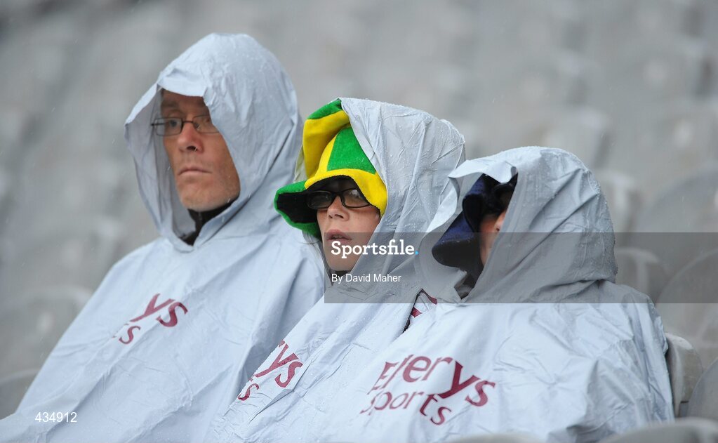 13 June 2010; Spectators look on during the heavy rain during the  Meath against  Laois game. Leinster GAA Football Senior Championship Quarter-Final, Meath v Laois, Croke Park, Dublin. Picture credit: David Maher / SPORTSFILE