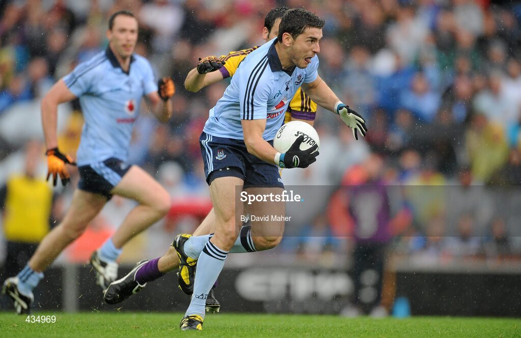 13 June 2010; Bernard Brogan goes past the Wexford full-bacck Graeme Molloy on his way to scoring the first goal for Dublin. Leinster GAA Football Senior Championship Quarter-Final, Dublin v Wexford, Croke Park, Dublin. Picture credit: David Maher / SPORTSFILE