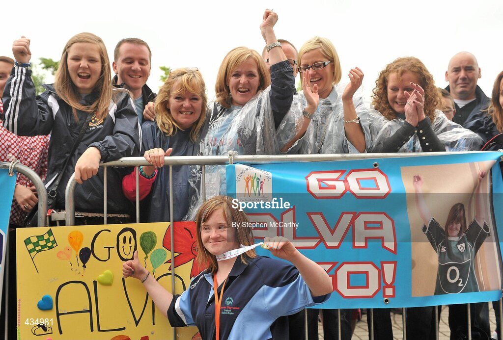 13 June 2010; Alva Kiberd, from Clondalkin, Dublin, celebrates with friends and family after picking up a gold medal with her Eastern Region team during the athletics relay during the final day of the 2010 Special Olympics Ireland Games. University of Limerick, Limerick. Picture credit: Stephen McCarthy / SPORTSFILE