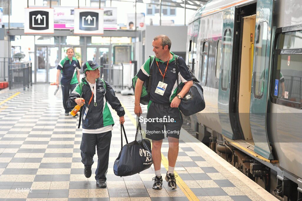 13 June 2010; Connacht Region athlete Matthew Forde, from Salthill, Galway, prepares to board his train with coach John Kinneen following the final day of the 2010 Special Olympics Ireland Games. Limerick Railway Station, Limerick. Picture credit: Stephen McCarthy / SPORTSFILE
