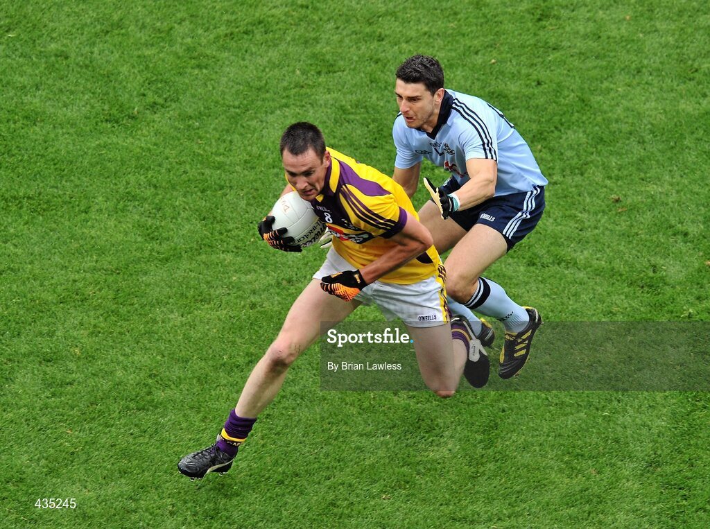 13 June 2010; Daithí Waters, Wexford, in action against Bernard Brogan, Dublin. Leinster GAA Football Senior Championship Quarter-Final, Dublin v Wexford, Croke Park, Dublin. Picture credit: Brian Lawless / SPORTSFILE