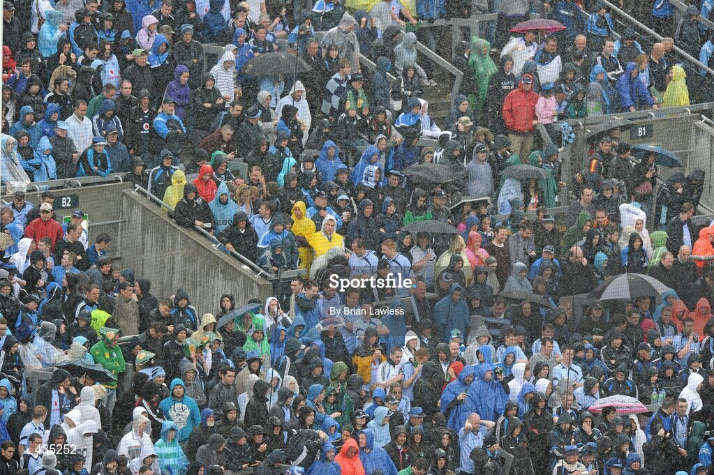 13 June 2010; Dublin fans endure a heavy shower during the match. Leinster GAA Football Senior Championship Quarter-Final, Dublin v Wexford, Croke Park, Dublin. Picture credit: Brian Lawless / SPORTSFILE