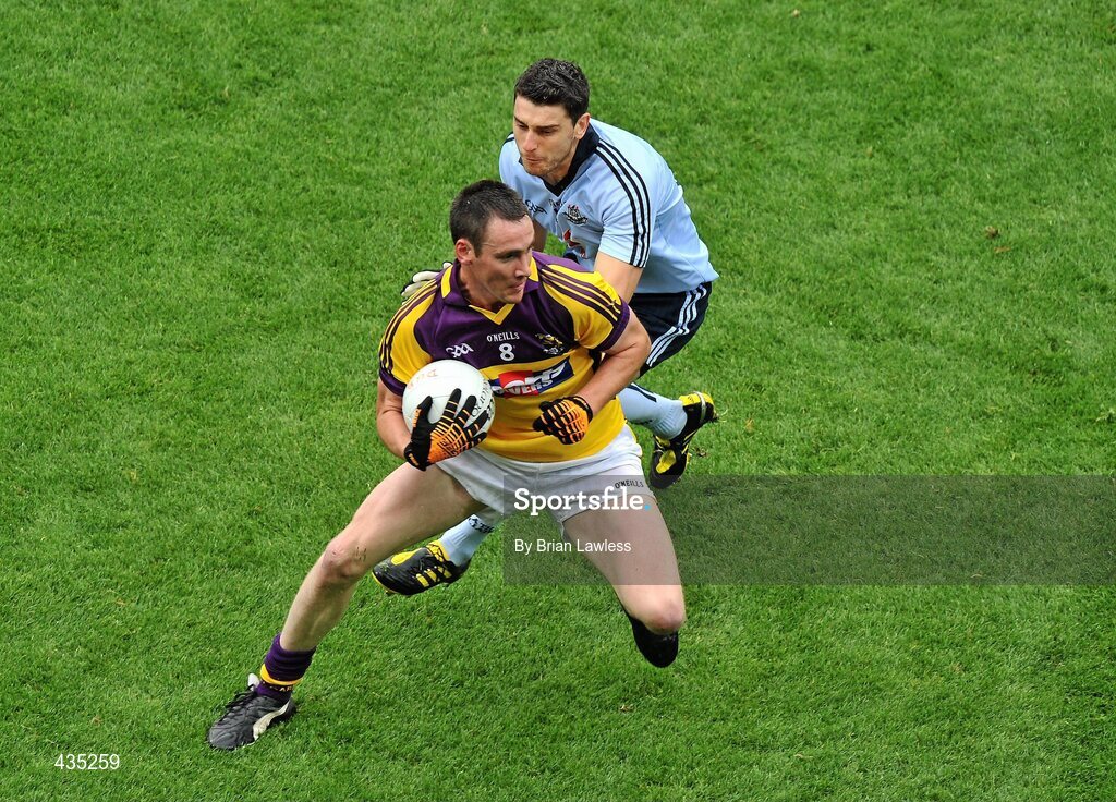 13 June 2010; Daithí Waters, Wexford, in action against Bernard Brogan, Dublin. Leinster GAA Football Senior Championship Quarter-Final, Dublin v Wexford, Croke Park, Dublin. Picture credit: Brian Lawless / SPORTSFILE