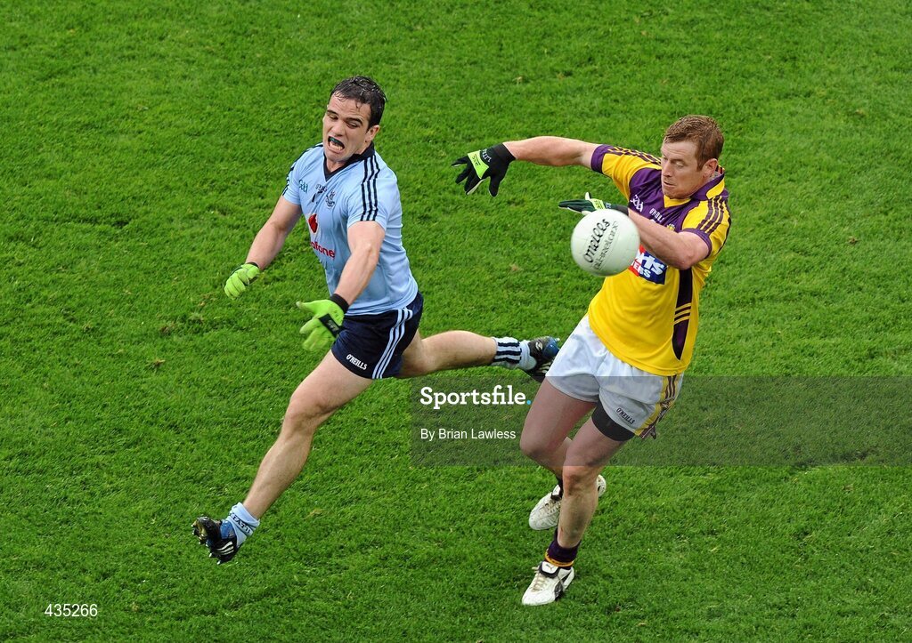 13 June 2010; Eric Bradley, Wexford, in action against Gerrard Brennan, Dublin. Leinster GAA Football Senior Championship Quarter-Final, Dublin v Wexford, Croke Park, Dublin. Picture credit: Brian Lawless / SPORTSFILE