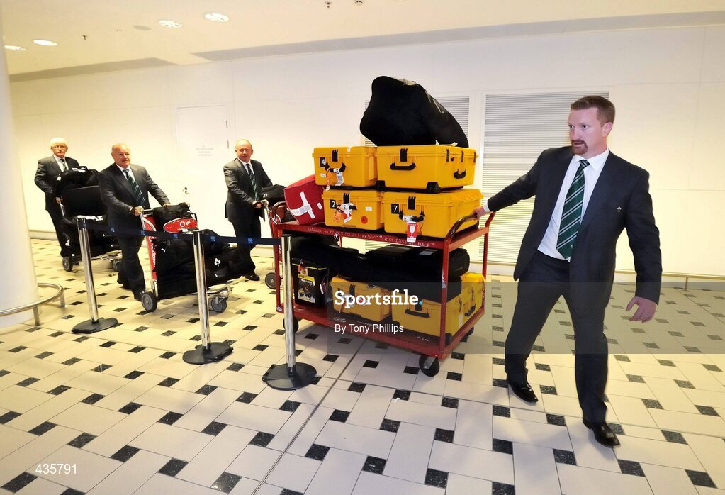 19 June 2010; The IRFU Communications & Media Manager Karl Richardson, right, with Head Coach Declan Kidney, Team Masseur Willie Bennett and Team Manager Paul McNaughton, left, on their arrival in Brisbane Airport ahead of their game against Australia on Saturday 26 June. Brisbane Airport, Brisbane, Australia. Picture credit: Tony Phillips / SPORTSFILE