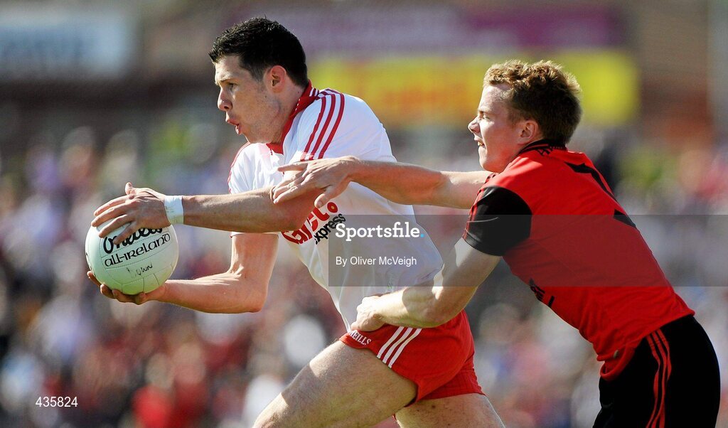 19 June 2010; Sean Cavanagh, Tyrone, in action against Brendan McArdle, Down. Ulster GAA Football Senior Championship Semi-Final, Tyrone v Down, Casement Park, Belfast, Co. Antrim. Picture credit: Oliver McVeigh / SPORTSFILE