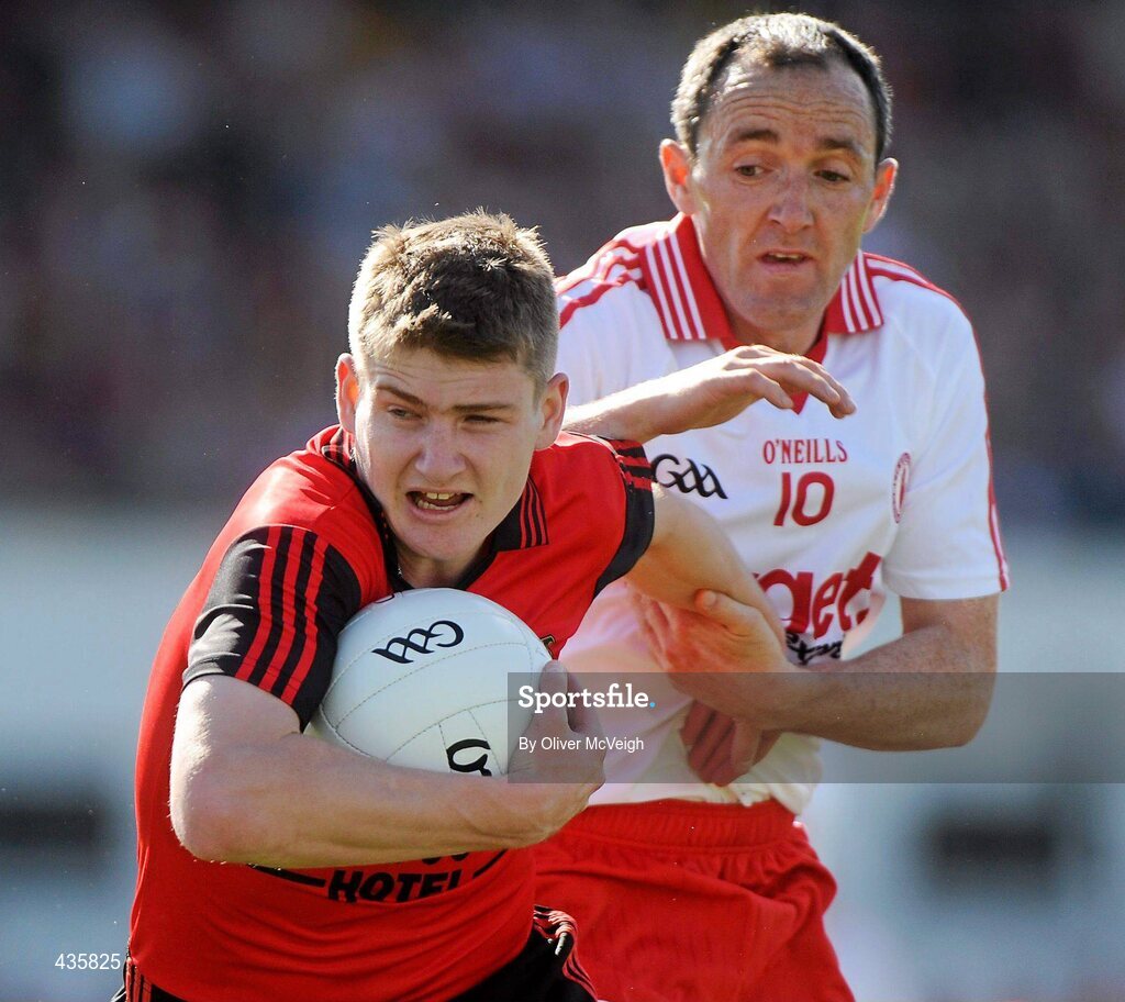19 June 2010; Conor Maginn, Down, in action against Brian Dooher, Tyrone. Ulster GAA Football Senior Championship Semi-Final, Tyrone v Down, Casement Park, Belfast, Co. Antrim. Picture credit: Oliver McVeigh / SPORTSFILE
