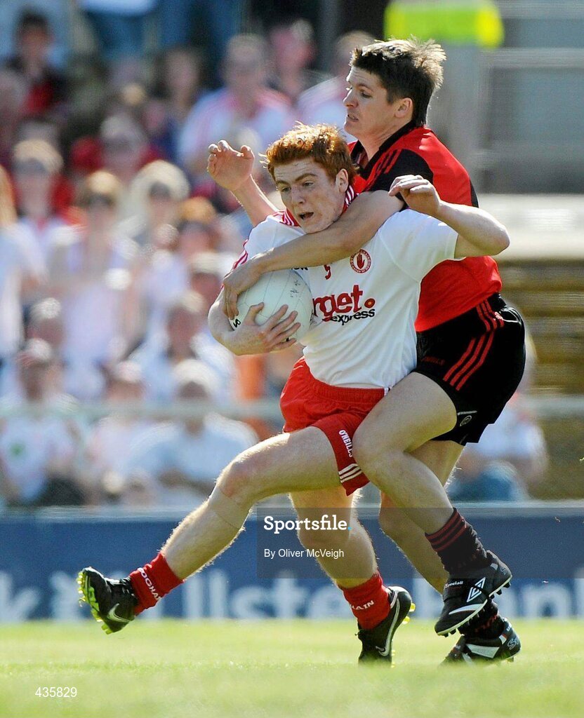 19 June 2010; Peter Harte, Tyrone, in action against Damian Rafferty, Down. Ulster GAA Football Senior Championship Semi-Final, Casement Park, Belfast, Co. Antrim. Picture credit: Oliver McVeigh / SPORTSFILE