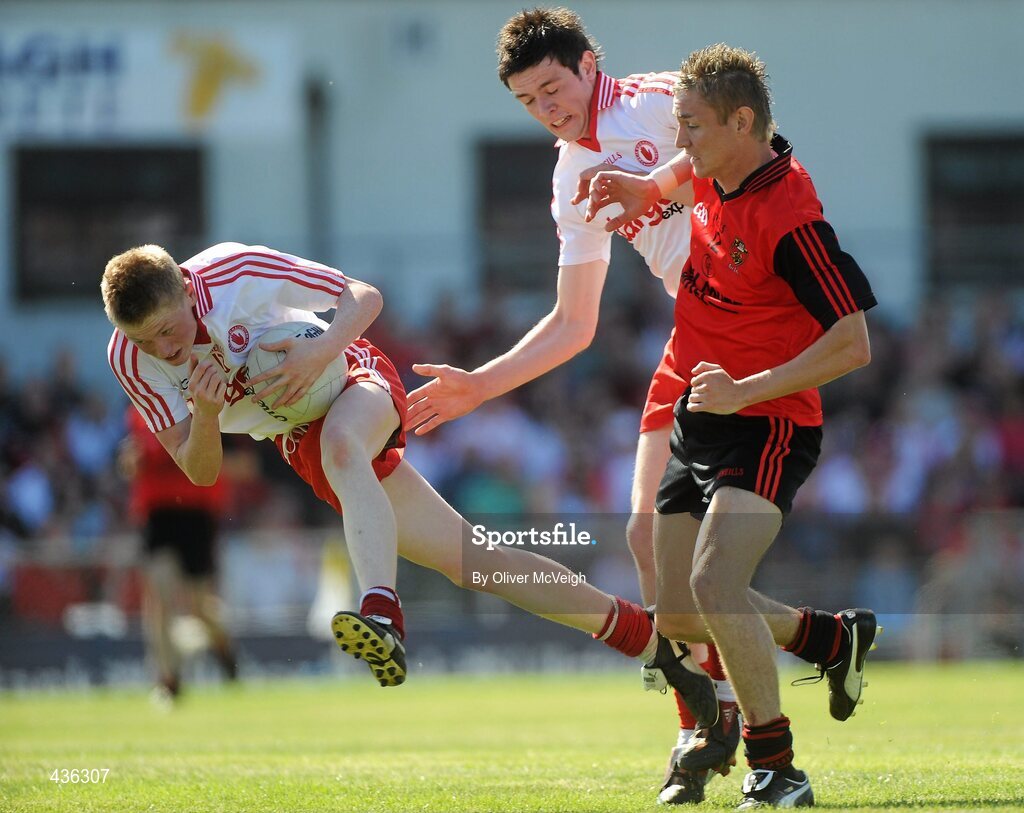 19 June 2010; Stefan Tierney and Conor Clarke, Tyrone, in action against Caolan Mooney, Down. Ulster GAA Football Minor Championship Semi-Final, Tyrone v Down, Casement Park, Belfast, Co. Antrim. Picture credit: Oliver McVeigh / SPORTSFILE