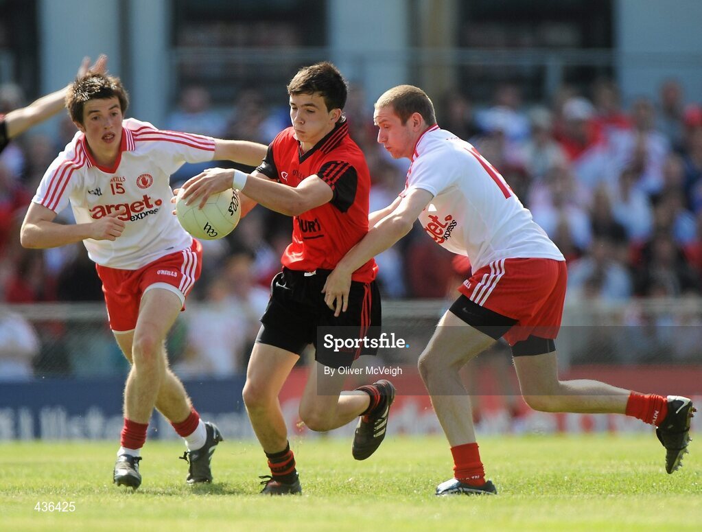 19 June 2010; Denis Murtagh, Down, in action against Ronan O'Neill and Enda McGahan, Tyrone. Ulster GAA Football Minor Championship Semi-Final, Tyrone v Down, Casement Park, Belfast, Co. Antrim. Picture credit: Oliver McVeigh / SPORTSFILE