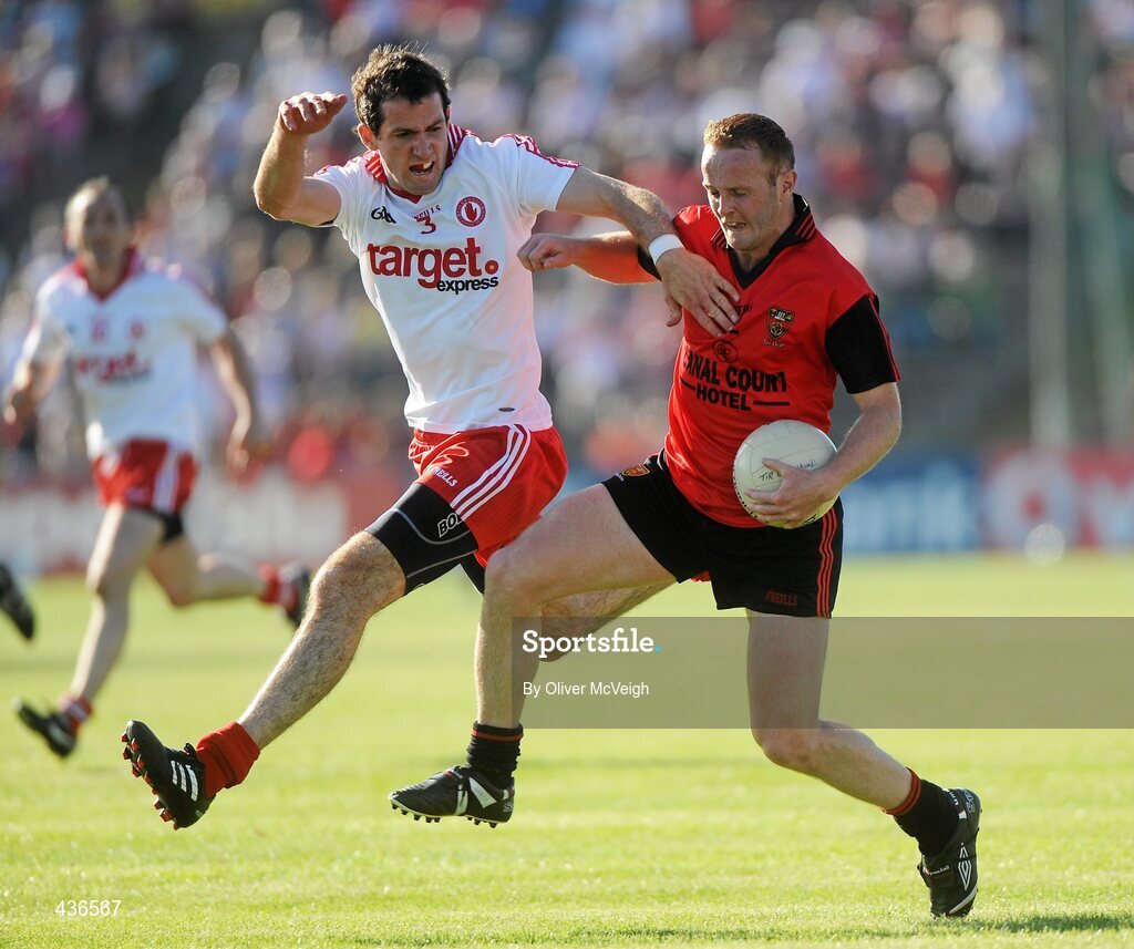 19 June 2010; Brendan Coulter, Down, in action against Justin McMahon, Tyrone. Ulster GAA Football Senior Championship Semi-Final, Casement Park, Belfast, Co. Antrim. Picture credit: Oliver McVeigh / SPORTSFILE