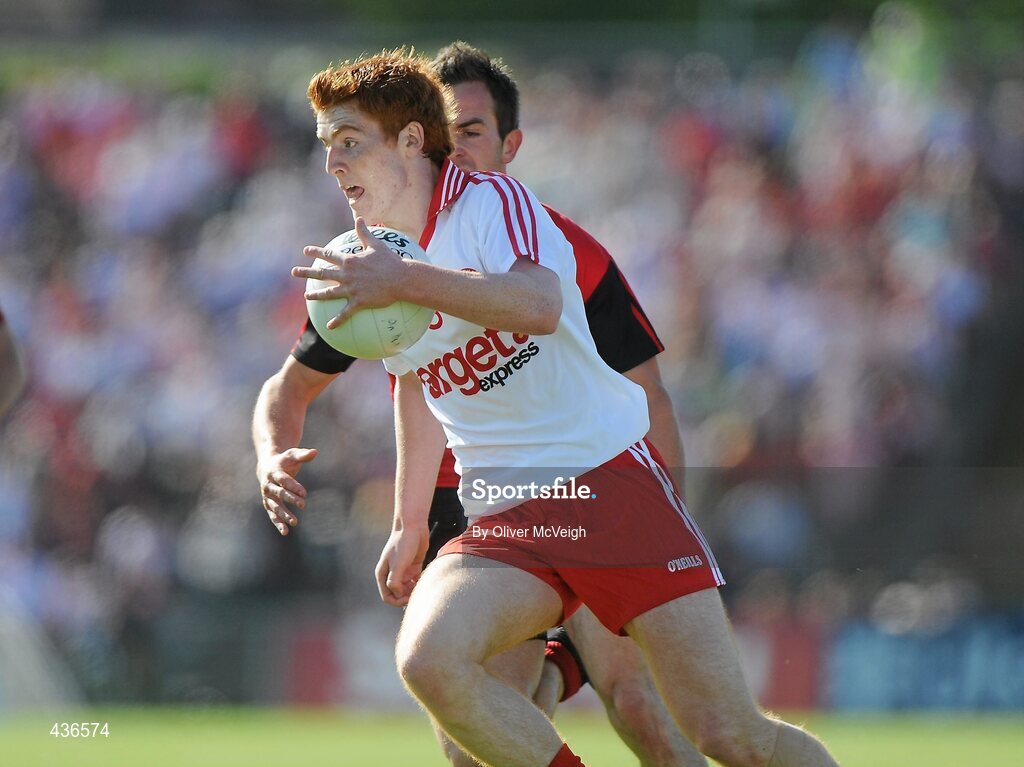 19 June 2010; Peter Harte, Tyrone, in action against Mark Poland, Down. Ulster GAA Football Senior Championship Semi-Final, Casement Park, Belfast, Co. Antrim. Picture credit: Oliver McVeigh / SPORTSFILE