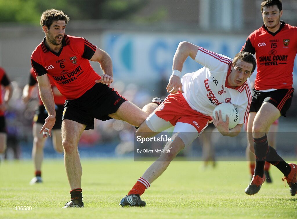 19 June 2010; Colm Cavanagh, Tyrone, in action against Kevin McKernan, Down. Ulster GAA Football Senior Championship Semi-Final, Casement Park, Belfast, Co. Antrim. Picture credit: Oliver McVeigh / SPORTSFILE