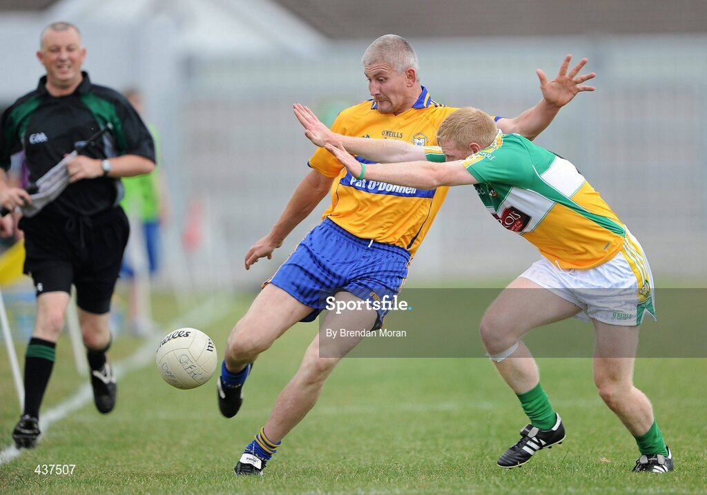26 June 2010; David Russell, Clare, in action against Niall Darby, Offaly. GAA Football All-Ireland Senior Championship Qualifier Round 1, Offaly v Clare, O'Connor Park, Tullamore, Co. Offaly. Picture credit: Brendan Moran / SPORTSFILE