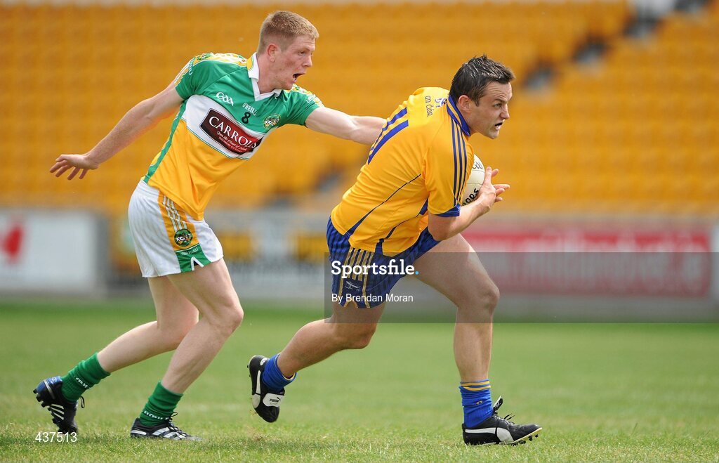 26 June 2010; Peter O'Dwyer, Clare, in action against Brian Geraghty, Offaly. GAA Football All-Ireland Senior Championship Qualifier Round 1, Offaly v Clare, O'Connor Park, Tullamore, Co. Offaly. Picture credit: Brendan Moran / SPORTSFILE