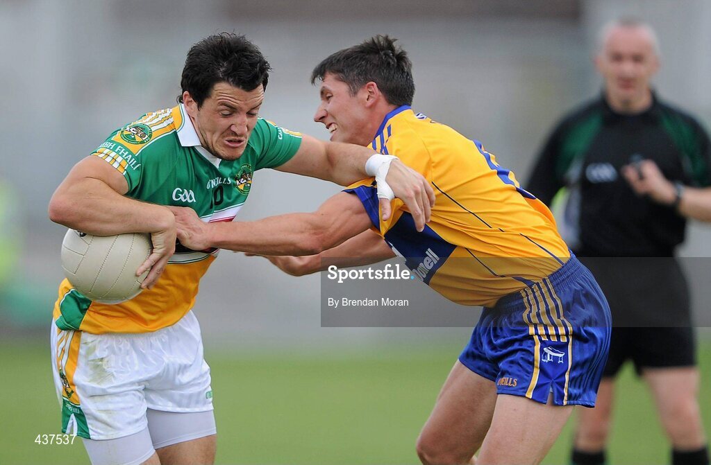 26 June 2010; John Reynolds, Offaly, in action against Gordon Kelly, Clare. GAA Football All-Ireland Senior Championship Qualifier Round 1, Offaly v Clare, O'Connor Park, Tullamore, Co. Offaly. Picture credit: Brendan Moran / SPORTSFILE