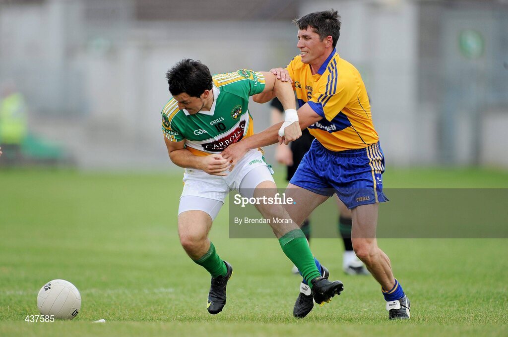 26 June 2010; John Reynolds, Offaly, in action against Gordon Kelly, Clare. GAA Football All-Ireland Senior Championship Qualifier Round 1, Offaly v Clare, O'Connor Park, Tullamore, Co. Offaly. Picture credit: Brendan Moran / SPORTSFILE