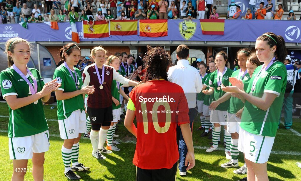 26 June 2010; Republic of Ireland players applaud as Spain captain Amanda Sampedro makes her way to collect the trophy. UEFA Women's Under 17 Championship Final, Spain v Republic of Ireland, Colovray Sports Centre, Nyon, Switzerland. Picture credit: Stephen McCarthy / SPORTSFILE