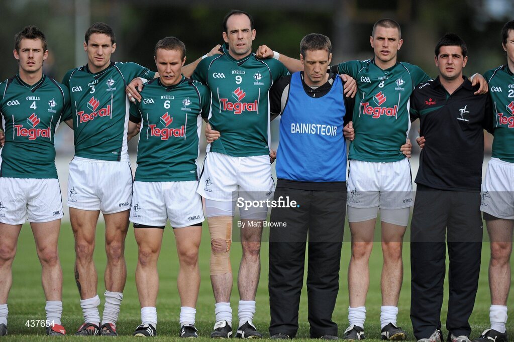 26 June 2010; Dermot Earley, 9, Kildare, stands with his team manager Kieran McGeeney and team mates during the National Anthem. GAA Football All-Ireland Senior Championship Qualifier Round 1, Kildare v Antrim, St Conleth's Park, Newbridge, Co. Kildare. Picture credit: Matt Browne / SPORTSFILE