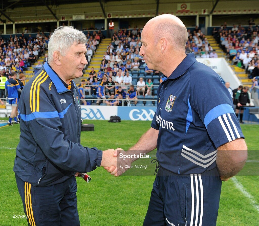26 June 2010; Wicklow manager Mick O'Dwyer and Cavan manager Tommy Carr shake hands before the GAA Football All-Ireland Senior Championship Qualifier Round 1 match between Cavan and Wicklow at Kingspan Breffni Park in Cavan. Photo by Oliver McVeigh/Sportsfile