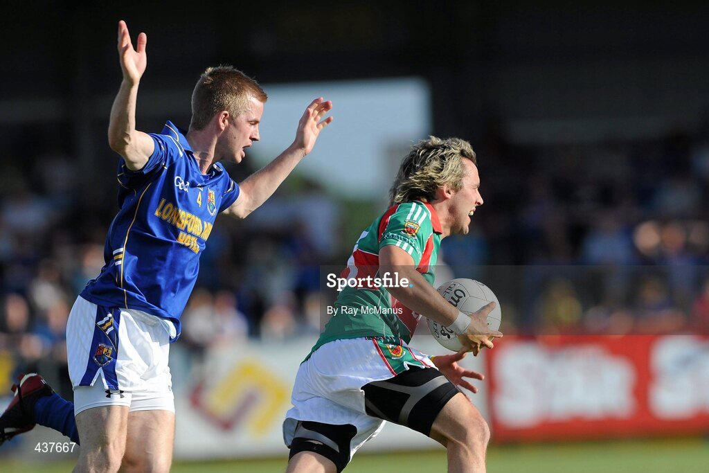 26 June 2010; Conor Mortimer, Mayo, in action against Declan Reilly, Longford. GAA Football All-Ireland Senior Championship Qualifier Round 1, Longford v Mayo, Pearse Park, Longford. Picture credit: Ray McManus / SPORTSFILE