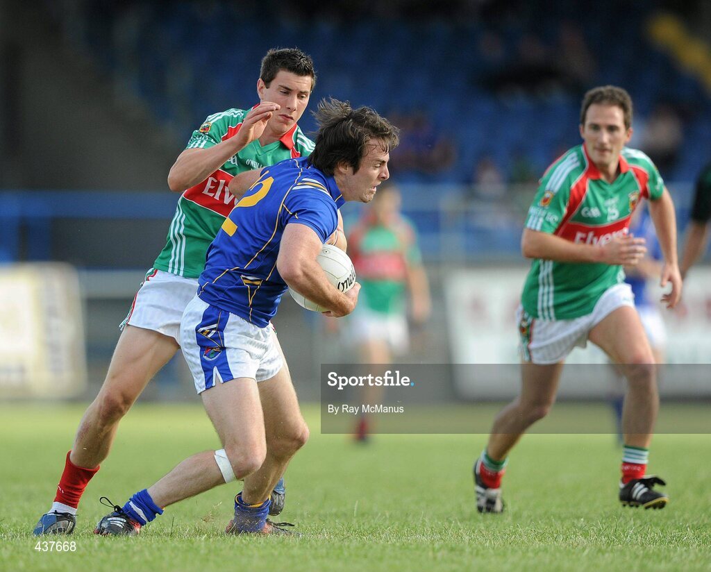 26 June 2010; Kevin Mulligan, Longford, in action against Alan Freeman, Mayo. GAA Football All-Ireland Senior Championship Qualifier Round 1, Longford v Mayo, Pearse Park, Longford. Picture credit: Ray McManus / SPORTSFILE