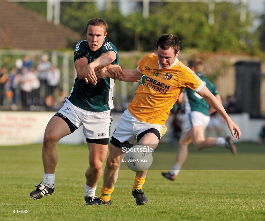 26 June 2010; Michael McCann, Antrim, in action against Brian Flanagan, Kildare. GAA Football All-Ireland Senior Championship Qualifier Round 1, Kildare v Antrim, St Conleth's Park, Newbridge, Co. Kildare. Picture credit: Barry Cregg / SPORTSFILE