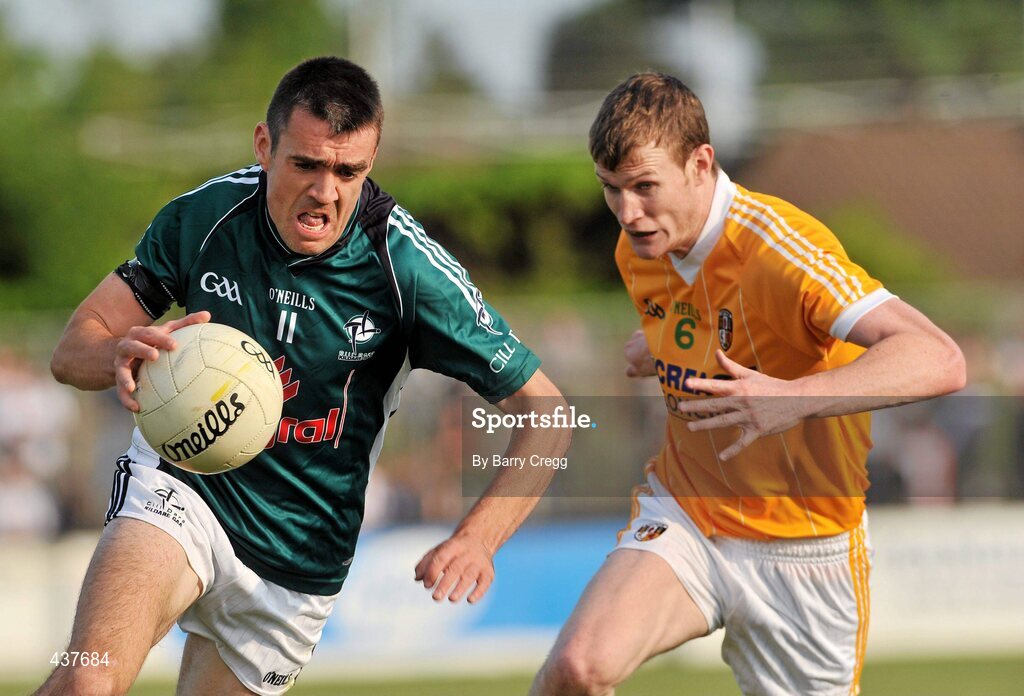 26 June 2010; John Doyle, Kildare, in action against Justin Crozier, Antrim. GAA Football All-Ireland Senior Championship Qualifier Round 1, Kildare v Antrim, St Conleth's Park, Newbridge, Co. Kildare. Picture credit: Barry Cregg / SPORTSFILE