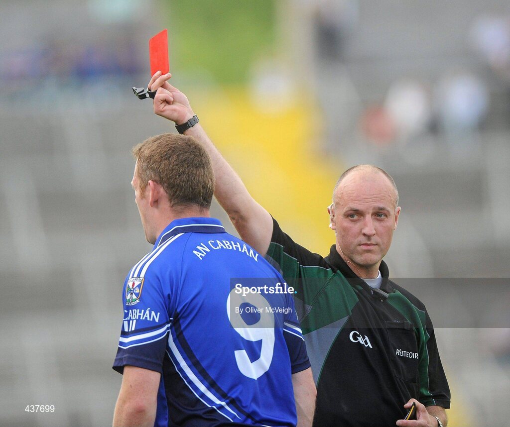 26 June 2010; Referee Cormac Reilly issues Lorcan Mulvey, Cavan, with a red card. GAA Football All-Ireland Senior Championship Qualifier Round 1, Cavan v Wicklow, Kingspan Breffni Park, Cavan. Picture credit: Oliver McVeigh / SPORTSFILE