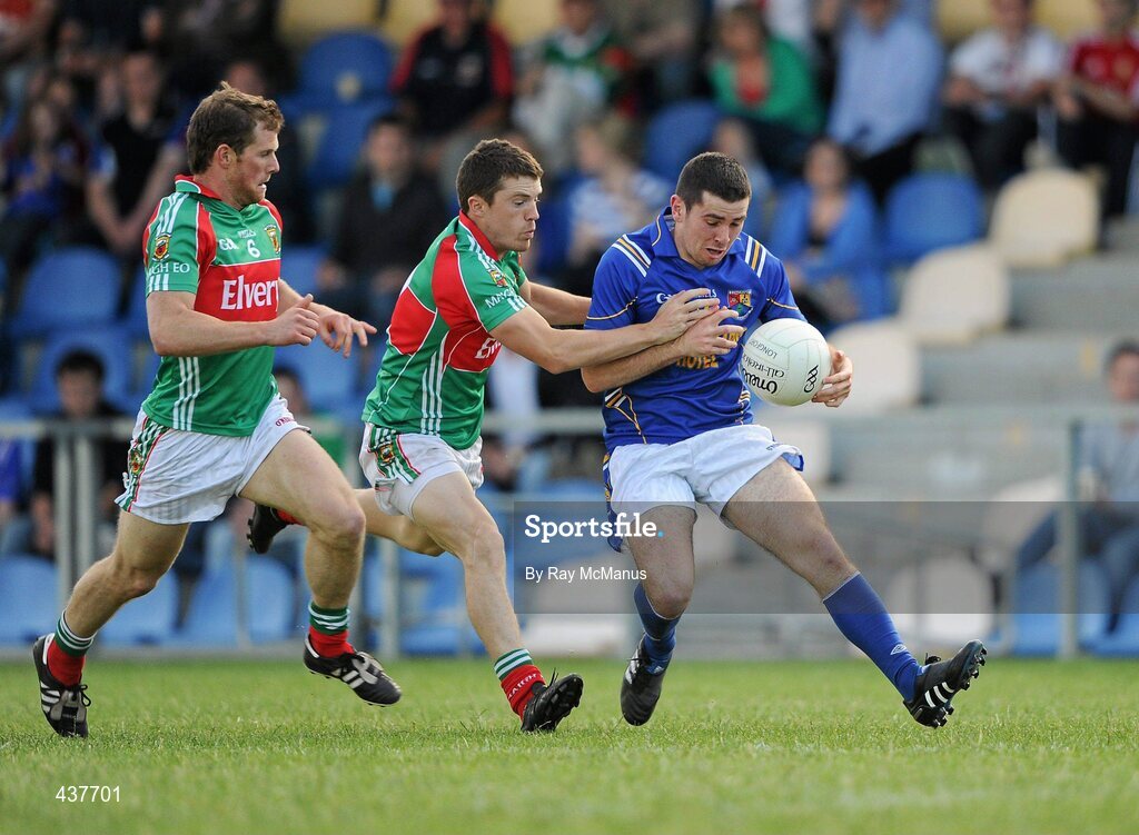 26 June 2010; Francis McGee, Longford, in action against Trevor Howley, left, and Chris Barrett, Mayo. GAA Football All-Ireland Senior Championship Qualifier Round 1, Longford v Mayo, Pearse Park, Longford. Picture credit: Ray McManus / SPORTSFILE