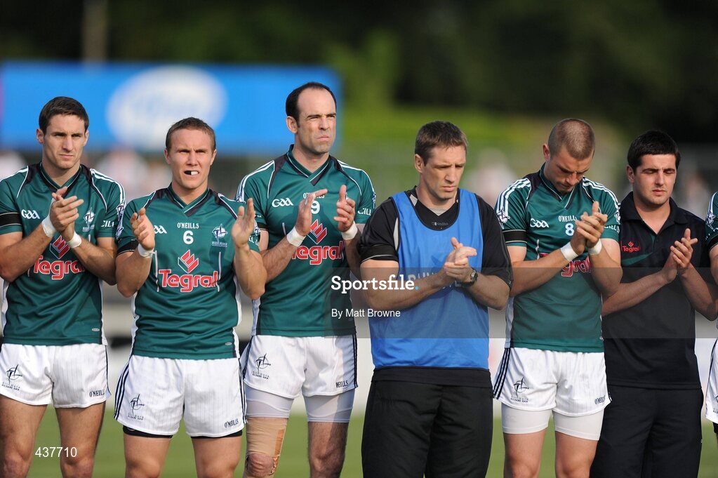 26 June 2010; Dermot Earley, 9, Kildare, during the minute's applause in memory of his late father Dermot Earley Snr, with his team manager Kieran McGeeney and team mates before the game against Antrim. GAA Football All-Ireland Senior Championship Qualifier Round 1, Kildare v Antrim, St Conleth's Park, Newbridge, Co. Kildare. Picture credit: Matt Browne / SPORTSFILE