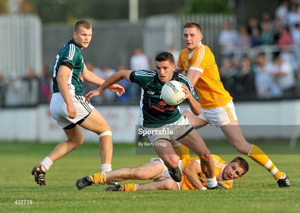 26 June 2010; Eamonn Callaghan, Kildare, in action against Tony Scullion, Antrim. GAA Football All-Ireland Senior Championship Qualifier Round 1, Kildare v Antrim, St Conleth's Park, Newbridge, Co. Kildare. Picture credit: Barry Cregg / SPORTSFILE