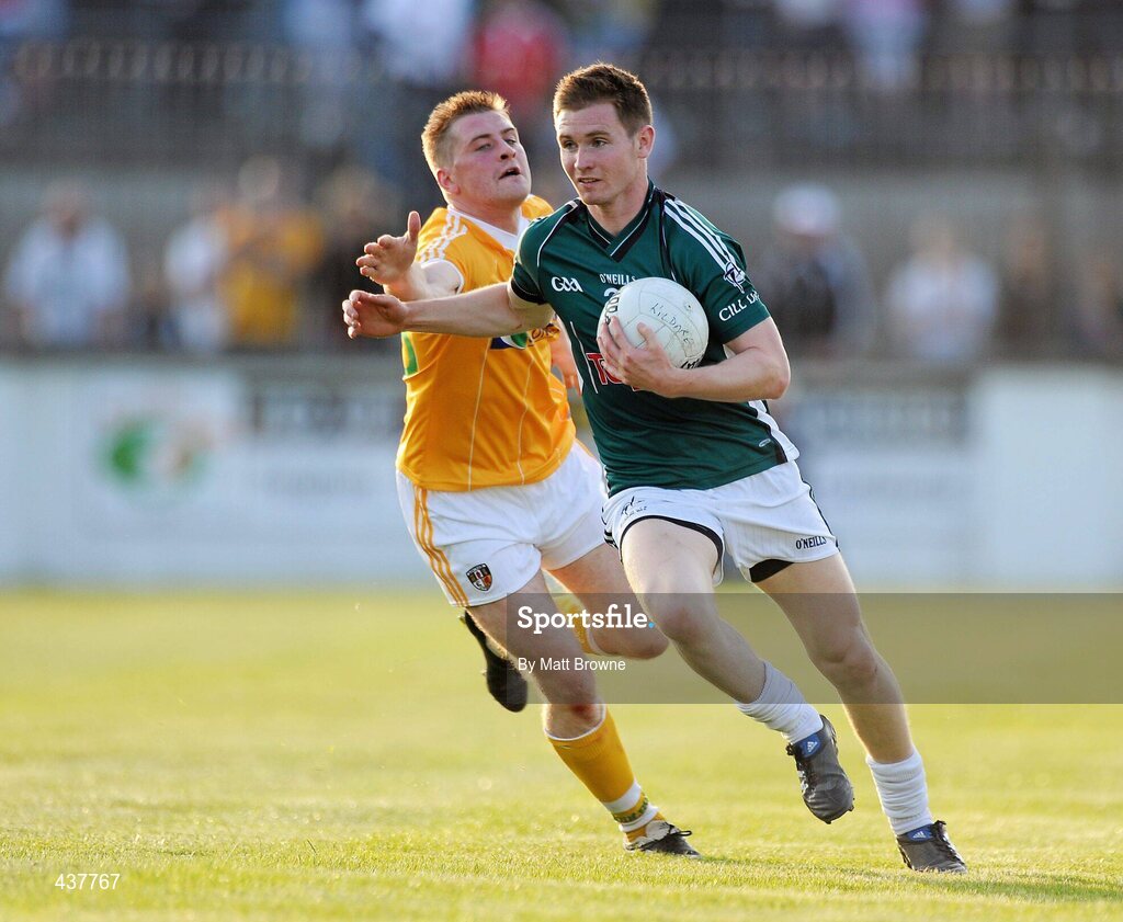 26 June 2010; Eoghan O'Flaherty, Kildare, in action against Kevin McGourty, Antrim. GAA Football All-Ireland Senior Championship Qualifier Round 1, Kildare v Antrim, St Conleth's Park, Newbridge, Co. Kildare. Picture credit: Matt Browne / SPORTSFILE