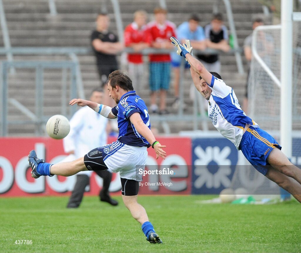 26 June 2010; Sean Johnston, Cavan, scores the winning point despite the attentions of Alan Byrne, Wicklow. GAA Football All-Ireland Senior Championship Qualifier Round 1, Cavan v Wicklow, Kingspan Breffni Park, Cavan. Picture credit: Oliver McVeigh / SPORTSFILE