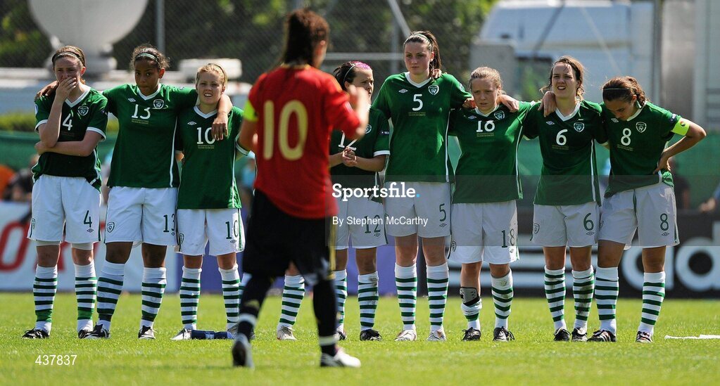 26 June 2010; Dejected Republic of Ireland players as Spain captain Amanda Sampedro walks back to the half-way line after scoring a penalty. UEFA Women's Under 17 Championship Final, Spain v Republic of Ireland, Colovray Sports Centre, Nyon, Switzerland. Picture credit: Stephen McCarthy / SPORTSFILE