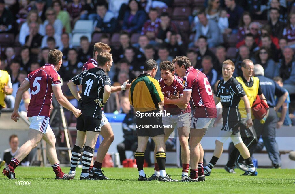 27 June 2010; Sean Armstrong, Galway, 11, protests with referee David Coldrick before being shown a second yellow card and subsequently being sent off. Connacht GAA Football Senior Championship Semi-Final, Galway v Sligo, Pearse Stadium, Galway. Picture credit: Diarmuid Greene / SPORTSFILE