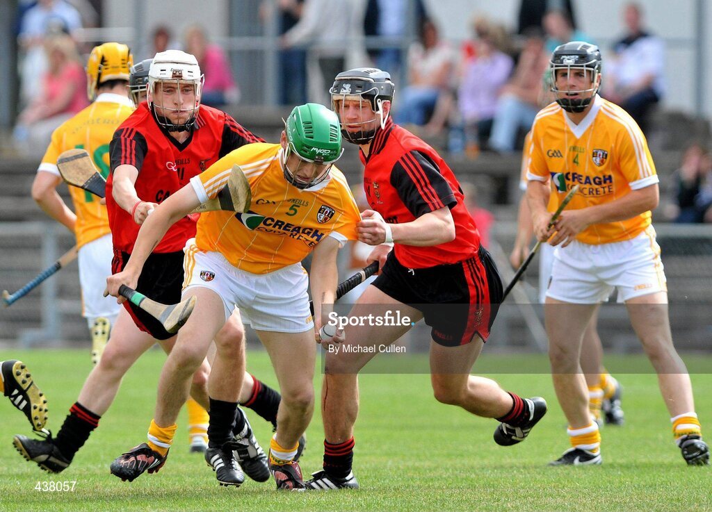 27 June 2010; Paul Shields, Antrim, in action against Stephen Clarke, left, and Paul Braniff, Down. Ulster GAA Hurling Senior Championship Final, Antrim v Down, Casement Park, Belfast. Picture credit: Michael Cullen / SPORTSFILE