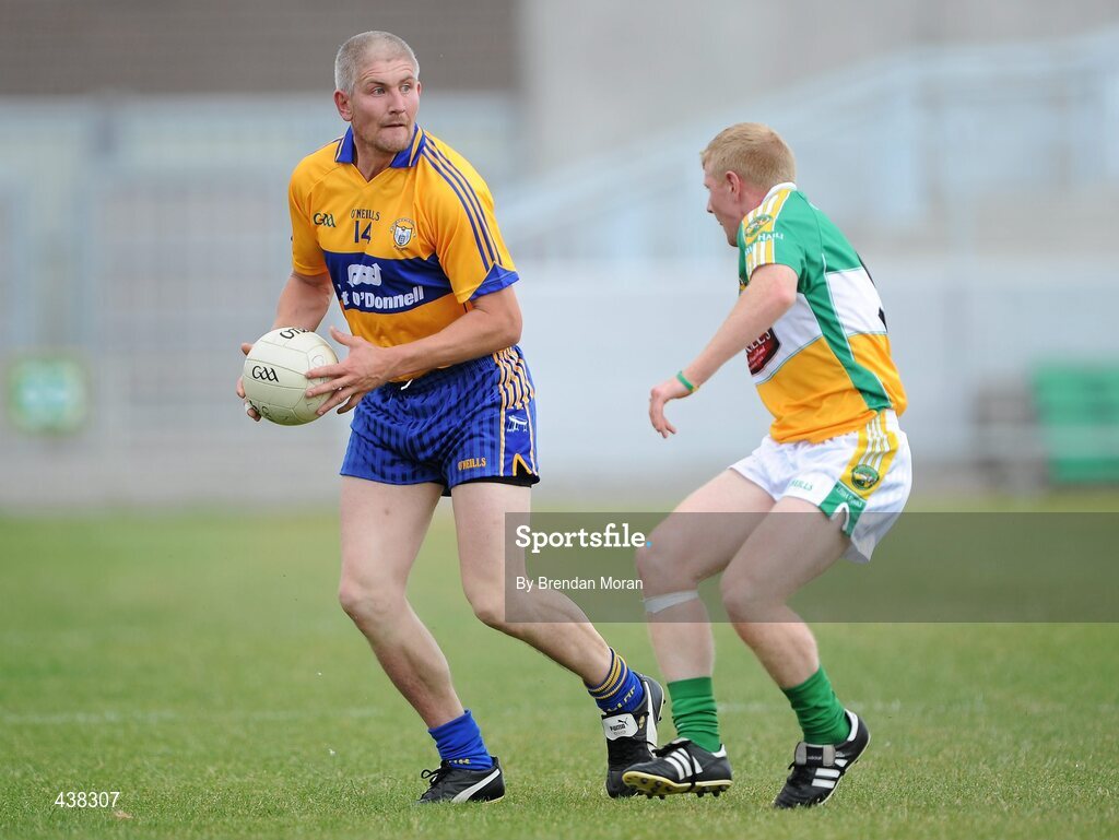 26 June 2010; David Russell, Clare, in action against Niall Darby, Offaly. GAA Football All-Ireland Senior Championship Qualifier Round 1, Offaly v Clare, O'Connor Park, Tullamore, Co. Offaly. Picture credit: Brendan Moran / SPORTSFILE