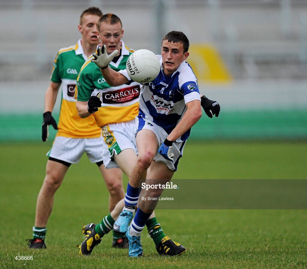 30 June 2010; Shane McCauley, Laois, in action against Peter Cunningham and Conor Lowry, left, Offaly. ESB Leinster GAA Football Minor Championship Semi-Final, Offaly v Laois, O'Connor Park, Tullamore, Co. Offaly. Picture credit: Brian Lawless / SPORTSFILE